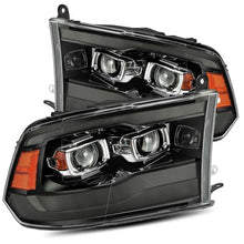 Cargar imagen en el visor de la galería, AlphaRex 09-18 Ram 1500HD LUXX Proj Headlight Plnk Style Jet Blk w/Activ Light/Seq Signal/Smoked DRL