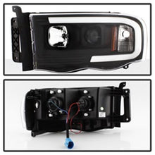 Cargar imagen en el visor de la galería, Spyder 02-05 Dodge Ram 1500 Light Bar Projector Headlights - Black (PRO-YD-DR02V2-LB-BK)