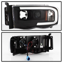 Cargar imagen en el visor de la galería, Spyder 02-05 Dodge Ram 1500 Light Bar Projector Headlights - Black (PRO-YD-DR02V2-LB-BK)